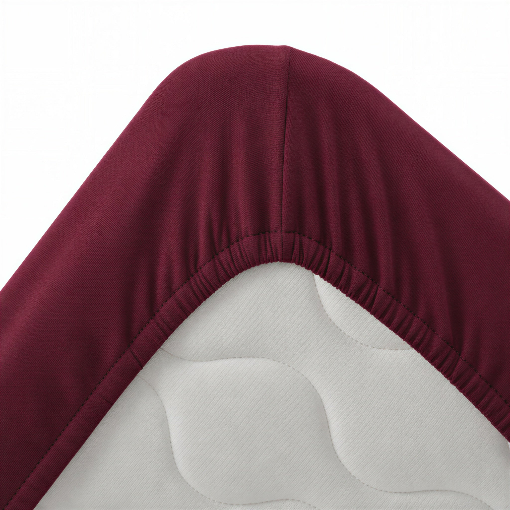 Bettecke mit umlaufendem Gummizug – Spannbettlaken in Burgund im Detail